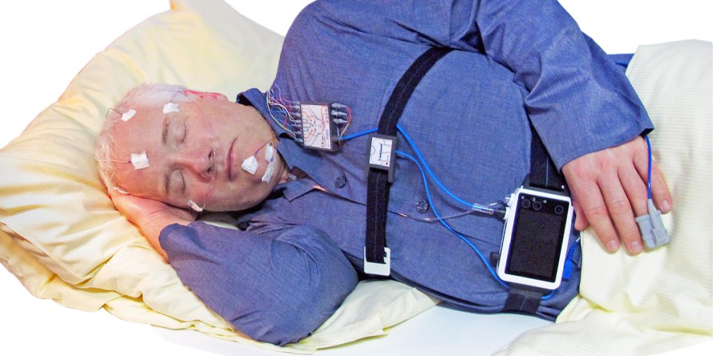 The SOMNOscreen HD as worn by a patient - highlighting how mobile the device is.